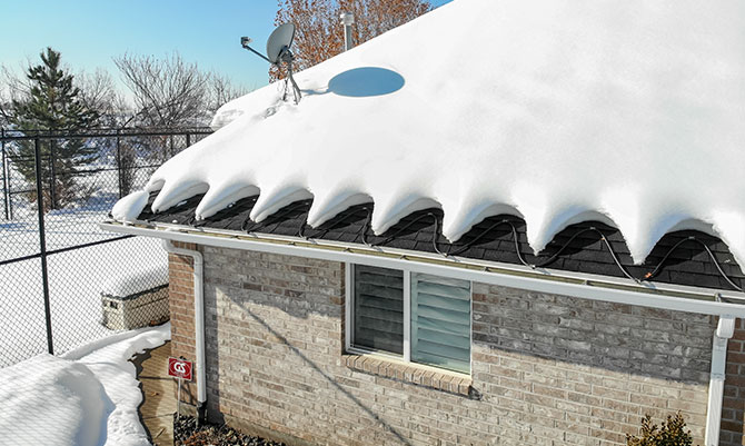 heat cable working on a snowy roof